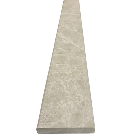 Close-up view of 4 x 36 Saddle Threshold Botticino Beige Marble Stone shows the top surface finish and bevel on both long edges