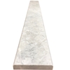 Close-up view of 4 x 24 Saddle Threshold Moon White Carrara Marble Stone shows the top surface finish and bevel on both long edges