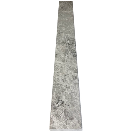 Close-up view of 4 x 32 Saddle Threshold Earth Grey Marble Stone shows the top surface finish and bevel on both long edges