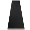 Close-up view of the Absolute Black Honed Granite Matte Stone Shower Curb, highlighting its sleek matte finish and enduring granite elegance.